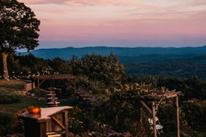 pink sunset overlooking grounds and mountain view