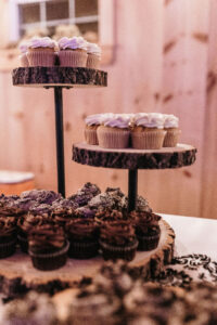 cupcakes on tree trunk platter