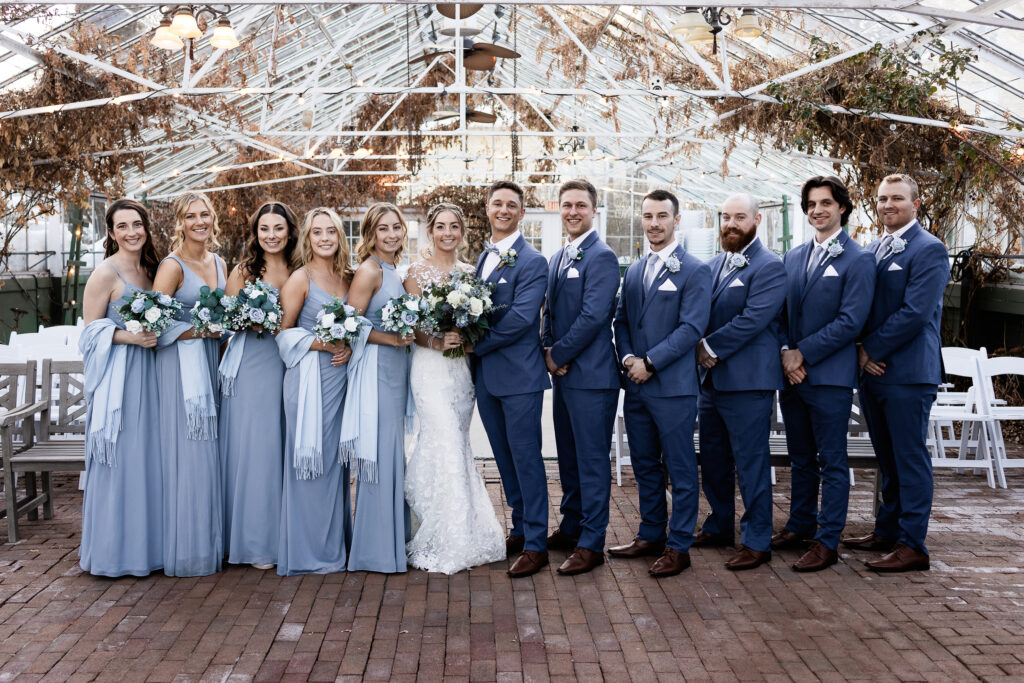 Bridal party portrait in greenhouse at The Barn on the Pemi in Plymouth NH by Lisa Smith Photography