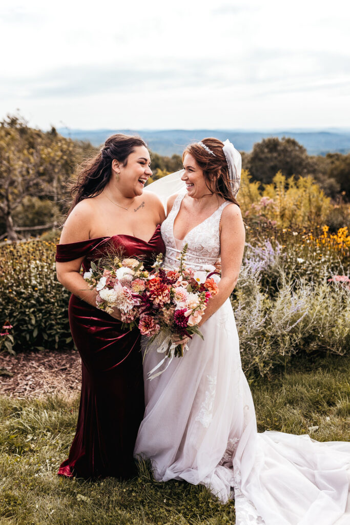 bride and bridesmaid laughing for bridal party photography tips by lisa smith photography