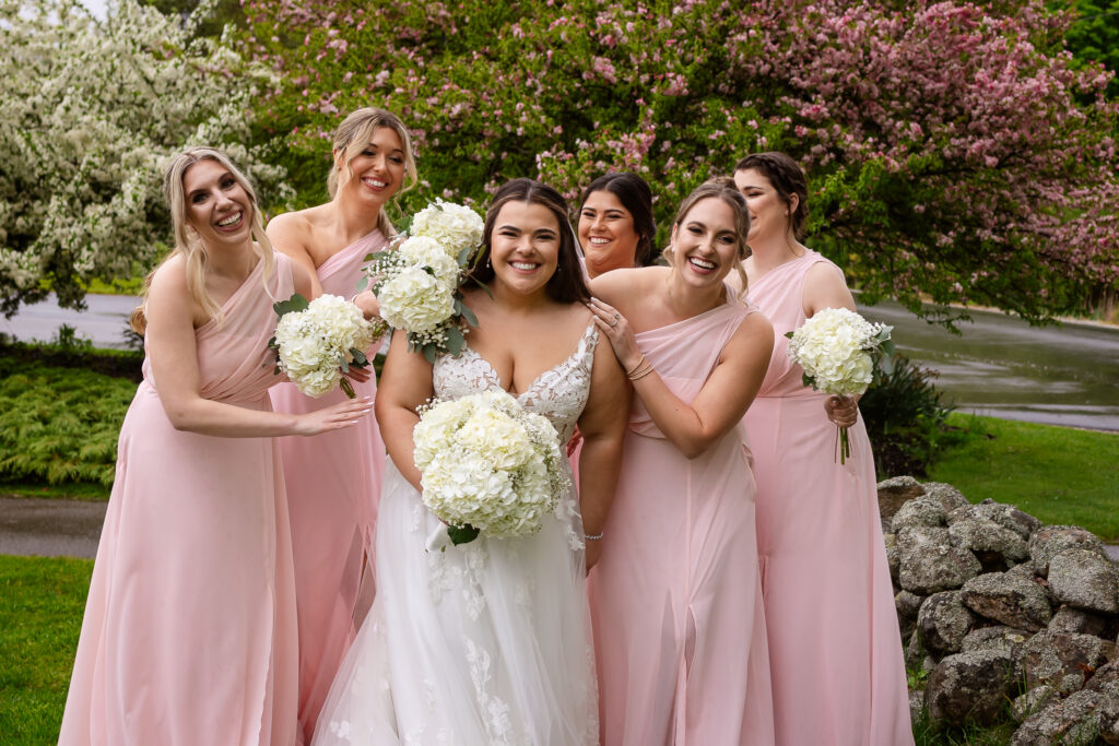 bride and bridesmaids laughing for bridal party photography tips by lisa smith photography