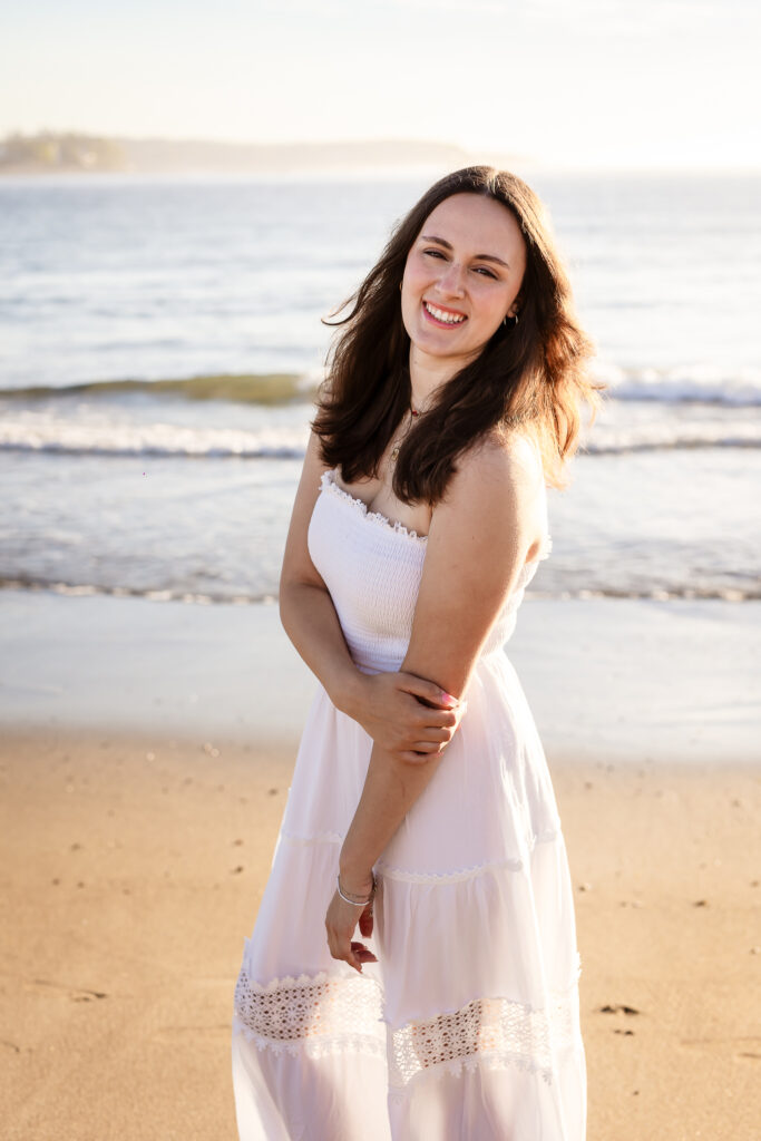 High school senior portrait nh girl in white dress posing at Shorts Sands in York Maine by NH Senior Photographer Lisa Smith Photography