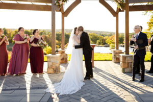 First kiss during wedding ceremony at pembroke pines country club by nh wedding photographer Lisa Smith Photography