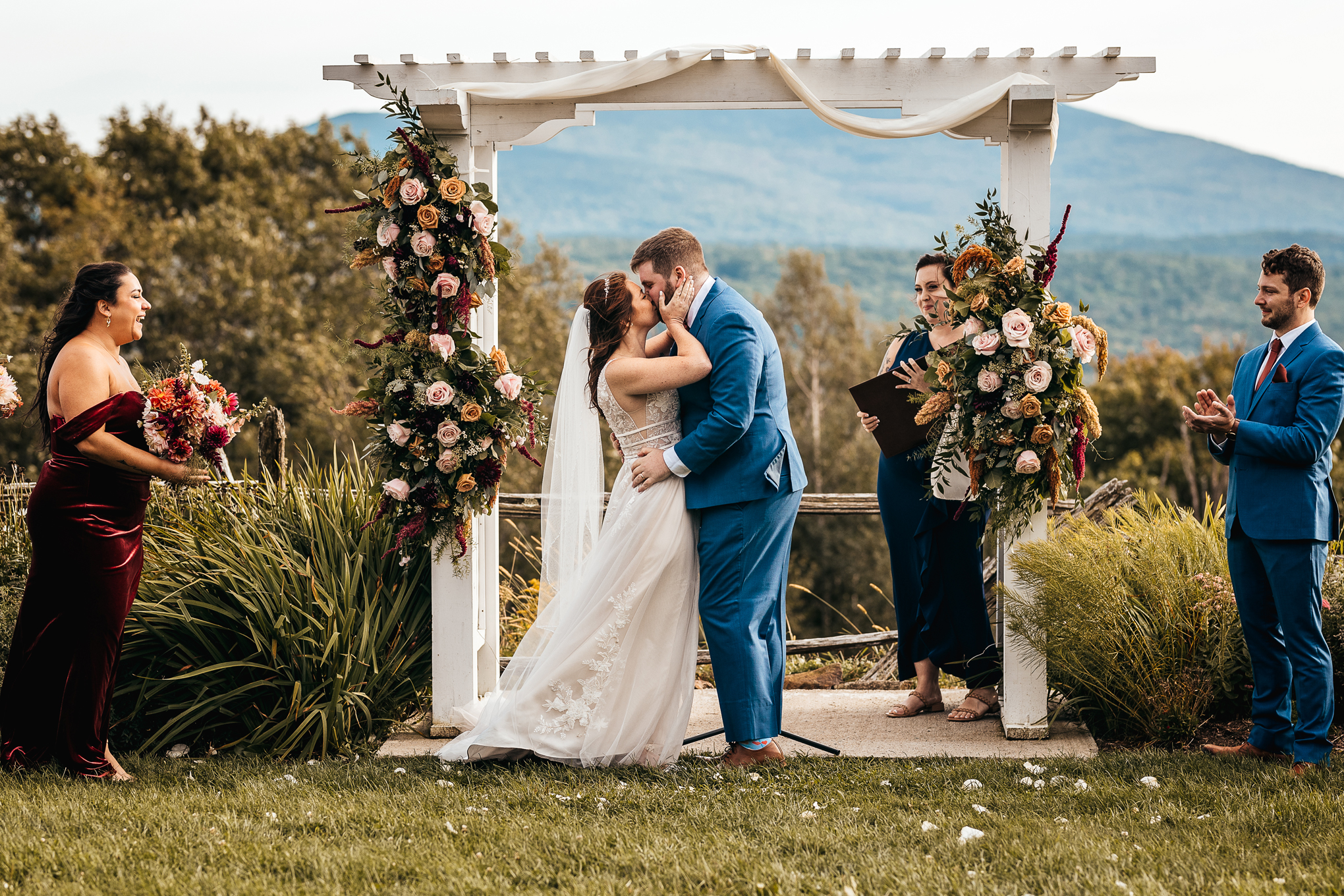 Bride and grooms first kiss at Cobb Hill Estate wedding ceremony by nh wedding photographer Lisa Smith Photography